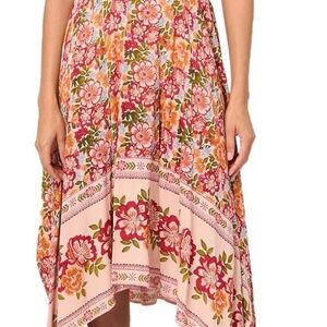 New Angie Floral Halter Dress with a Handkerchief Hem. Size Large.